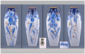 Doulton Burslem Hand Painted Blue and White Vase, showing iris flowers painted in shades of blue