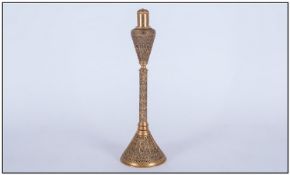 A French Gilded Metal Table Cigarette Lighter Of Unusual Shape, onlaid filigree work to the body.