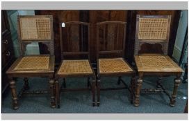 Pair Of Late 19th/Early 20th Century Hall Chairs. With Cane Backs And Seats, Raised On Turned
