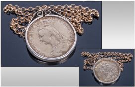 Victorian Silver Crown Date 1889. Set in a silver pendant and fitted on a belcher chain.