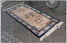 Black Chinese Wool Rug, 68 by 33 inches.