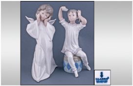 Lladro Figures, 2 in total. 1. Girl Shampooing, model number 1148. Issued 1971, 8.5" in height.