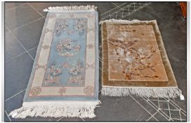 Wool Rug, dragon decoration on a light blue ground. Together with a small rug with bird and