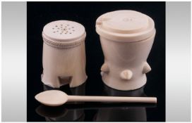 A South Seas Ivory Salt (With Spoon) And Pepper Set Of Native Design.