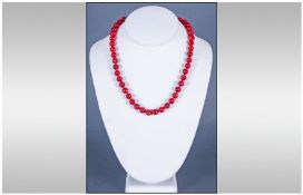 Coral Bead Necklace, deep red colours. Yellow metal clasp. Length 17 inches.