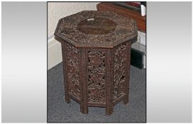 Anglo Indian Octagonal Carved Table, grape vine decoration throughout. Height 18.5 inches and 17.5