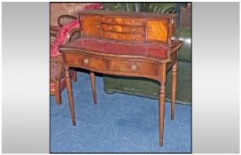 A Reproduction Mahogany Serpentine Fronted Leather Top Ladies Writing Table with three small drawers