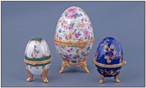 Three Various Egg Shaped Porcelain Trinket Boxes, one Limoge, one marked Past Times; from 3.75 - 6
