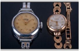 9ct Gold Cased Ladies Wristwatch, attached to a 9ct gold bracelet. Fully hallmarked. Circa 1960's.