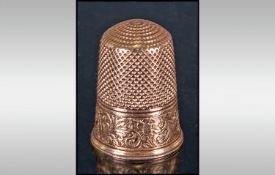 A Large Gold Continental Thimble, with broad floral border and beaded rims. Unmarked but tests