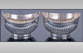 Pair Of Silver Salts. Fully hallmarked for Birmingham 1908. Each 3 inches in height.
