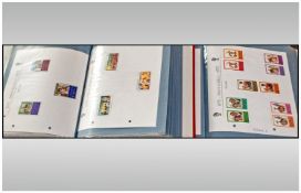 Two Red Folders Containing A Quantity Of Modern Commonwealth Stamps. Various Countries, Silver