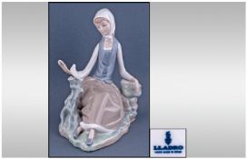 Lladro Figure 'Shepherdess With Dove' Model number 4660. Issued 1969. 6.5" in height. Excellent