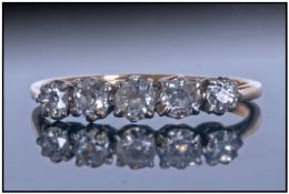 18ct Gold And Platinum 5 Stone Diamond Set Ring. Marked 18ct and platinum.