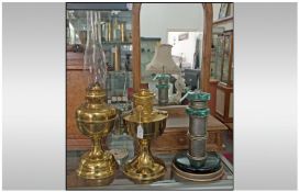 Two Brass Paraffin Lamps, one with a glass funnel. Together with a glass contemporary metal and