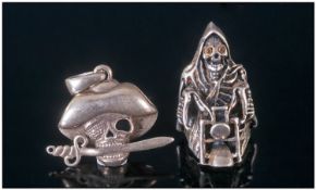 Gothic Interest. Comprising a fashion ring in the form of the Grim Reaper, fully hallmarked, also