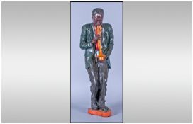 A Realistic Hand Painted 20th Century Large Figure of a Male Jazz Musician Playing the Trumpet.