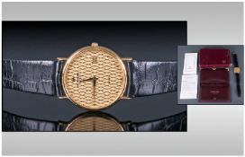 Raymond Weil 18ct Gold Plated Wrist Watch, fitted on a leather strap. Complete with leather wallet &