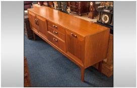 G Plan Sideboard, with 3 cupboards & a row of 3 drawers on square legs. 81" in width, 18" in