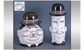 Flesh Pots Stoke On Trent. Two novelty figural jars and covers, modelled in the form of Laurel And