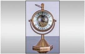 Vintage Swiss Brass And Glass Ball Shaped Glass Magnifying Desk Clock. With swivel action and