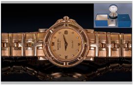 Raymond Weil Parsifal 18ct Gold Cased Date Just Wristwatch. With 18ct gold integral bracelet and