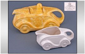 An Unusual Sadler Tea for Two 1930's Car Teapot with yellow sponge glaze. Together with a Sadler