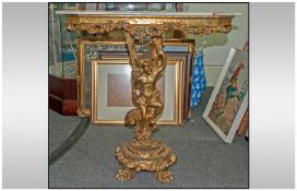 Roccoco Style Console Table, gilt figural base depicting Putti. Marble top, 32 inches high, 32