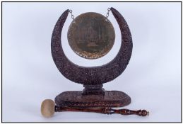 Taj Mahal Indian Early 20th Century Ornately Carved Wooden Gong Stand, with gong striker. Height