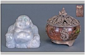 A Chinese Stone Buddah Figure in a joyous pose, 2.5" in height. with a Chinese silvered metal lidded