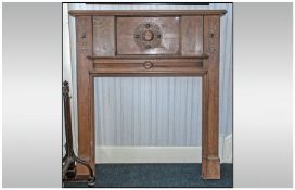 Jacobean Style Oak Fire Place. Circa 1930's. With a carved rounded centre and carved side