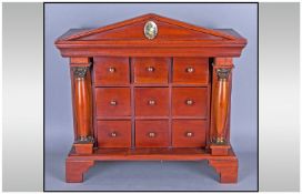 Reproduction 'Mahogany Spice' Cabinet. With 9 Drawers, Column Sides with Brass Finial's on an Arched