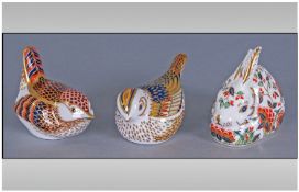 Three Royal Crown Derby Paperweights. 'Meadow Rabbit' with gold seal and original box, 'Firecrest'