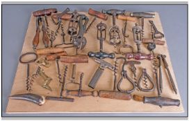 A Collection of Corkscrews comprises some novelty, some advertising. Mounted on a hard board. Approx