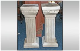 A Pair of Two Greek Cast Archaic Columns of Square Reeded Form.