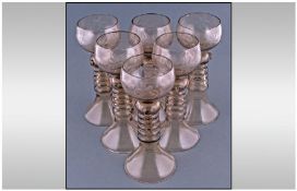 Set Of 6 Antique Hock Glasses on long knopped stems, the bowls engraved with a trailing vine design.