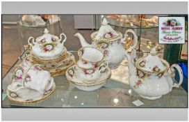 Royal Albert 'Celebration' Part Teaset comprising 4 cups,saucers and side plates, 2 bowls, two