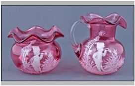 Two Mary Gregory Pink Coloured Glass Items comprising milk jug and sugar bowl.