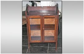 Early Twentieth Century Oak Display Unit, in the Arts and Crafts style, glazed front. Height 34