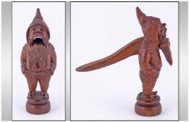 A Late Nineteenth Century Carved Walnut Nut Cracker in the shape of a Gnome Black Forest Figure. 8