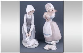 Nao By Lladro Figures, 2 in total. Young girls with lambs. Each figure 8" in height.