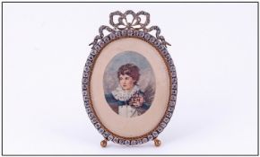 Late Nineteenth Century French Brass Small Picture Frame containing a print, encrusted with French