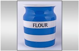 T.G Green Cornish Kitchen Ware, blue and white, lidded flour jar. Height 8 inches.