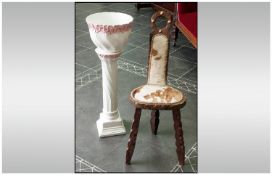 Small Wooden Chair, with three legs and cow hide seat and back. Together with ceramic jardiniere.