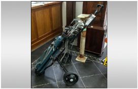 Set Of Golf Clubs With Trolley & Bag together with golf balls.