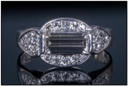 Ladies 14ct White Gold Diamond Ring, Set with central baguette cut diamond surrounded by pavee set