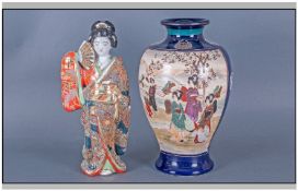 Japanese Female Figure and Blue Bordered Satsuma Vase, 12 inches high.