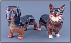 Beswick Dog Figures, 2 In Total. 1, Dachshund, model number 3013, height 4.25 inches. 2, Corgi,