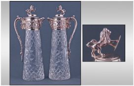 A Good Pair Of Silver And Cut Glass Claret Jugs, with lion figural covers/lids. Bacchus mask