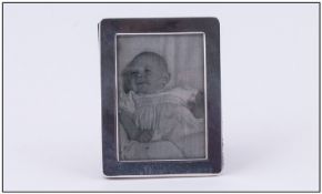 A Silver Framed Rectangle Shaped Photo Frame. Hallmark London 1998. 4 x 3.25 inches. Good